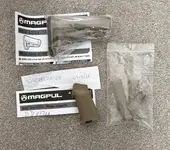 Genuine Magpul stock and pistol grip