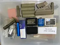 Various bits, training can, NGAL, flashlight