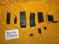 Assorted mags, tracer units, and laser boxes