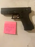 Glock 17 textured frame and straight metal trigger.